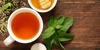 Natural immune boosting teas on a board with garnishments