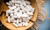 Weight loss pills in a bowl
