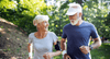 Elderly couple running in nature to improve brain function