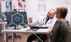 Doctor showing a patient a computer screen and explaining multiple sclerosis