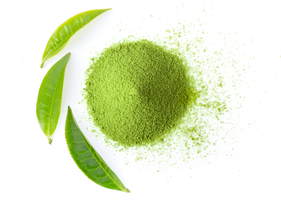 Green tea leaves promoting autophagy for longevity on a white background.