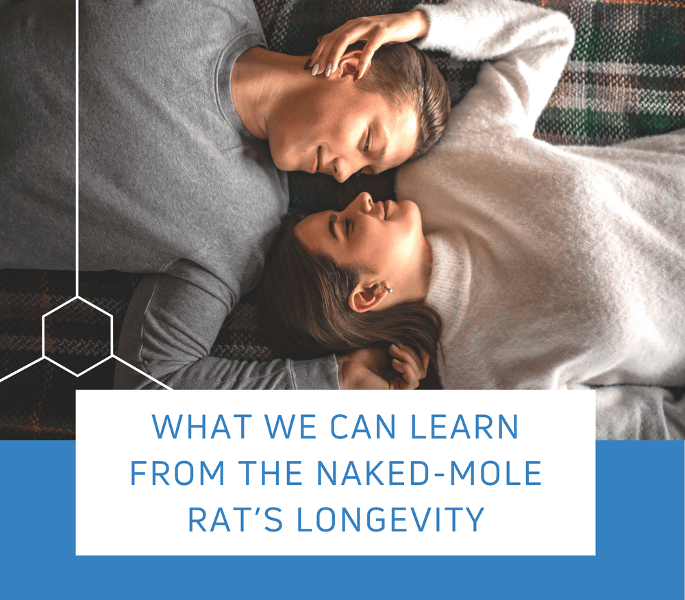 Man and woman laying on a blanket thinking of having a long life together.