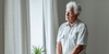 Man with Alzheimer's looking out a window
