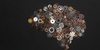 Gear icons in the shape of a brain representing common misconceptions about the brain