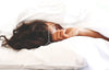 Woman sleeping who took spermidine to help her circadian rhythm