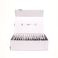 A white box with its lid open reveals multiple packets arranged inside. Simple black line icons on the lid indicate this is spermidineLIFE® Pro+ 4300mg 30-Pack, a dietary supplement by Longevity Labs, Inc featuring Celvio® Complex.