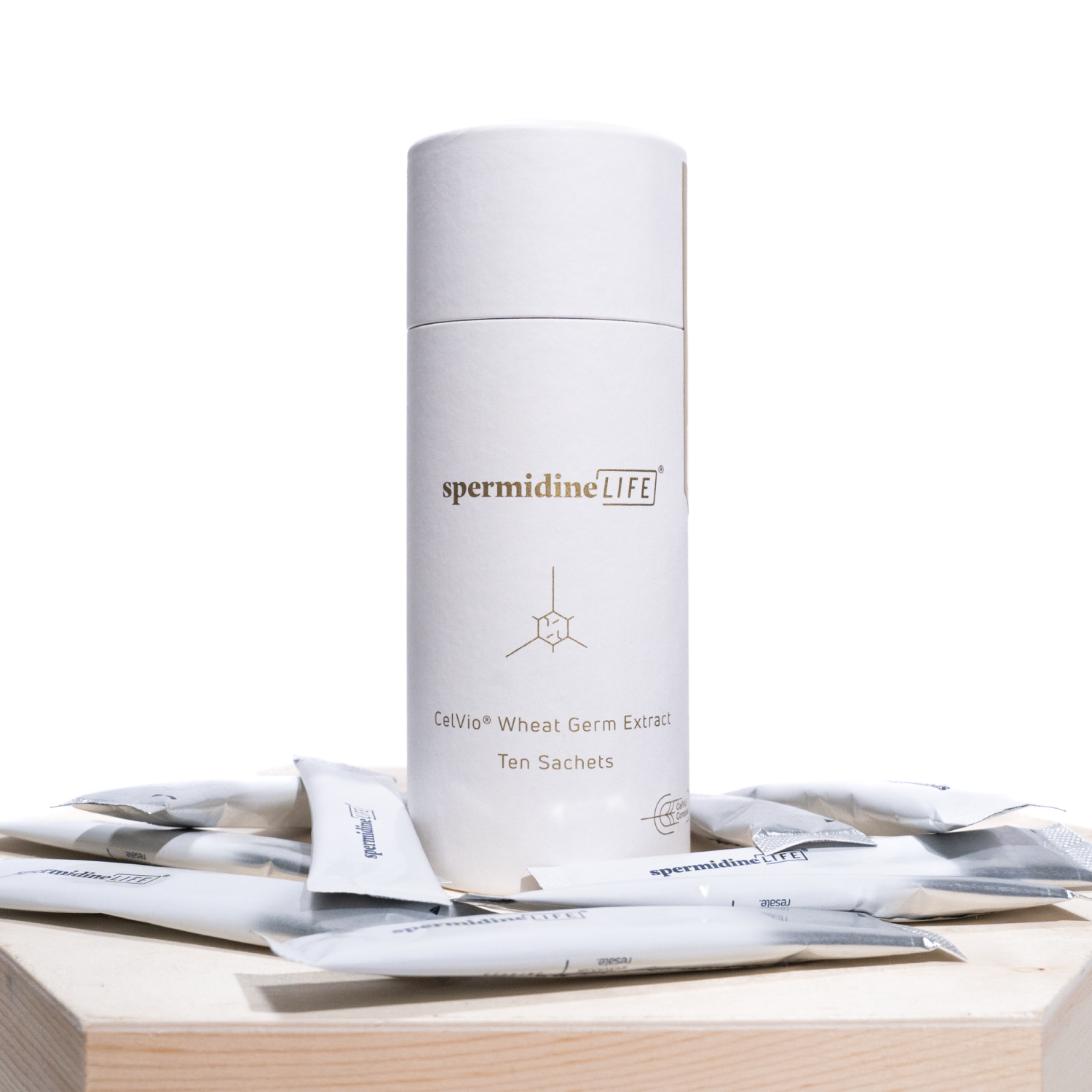 A bottle of spermidineLIFE® Pro+ 4300mg 10 Pack whitening cream sitting on top of a wooden box. (Brand Name: Longevity Labs, Inc)